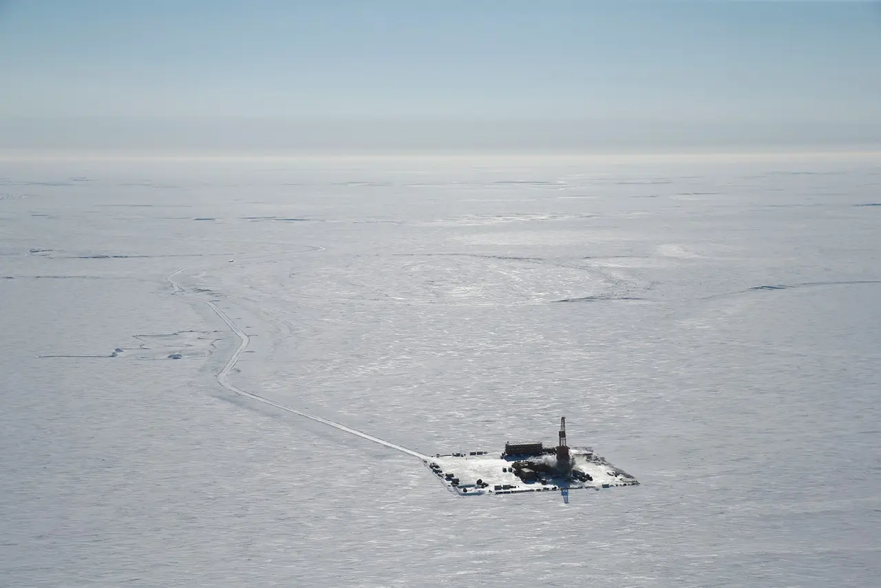 Aerial view of a drilling pad on the frozen North Slope